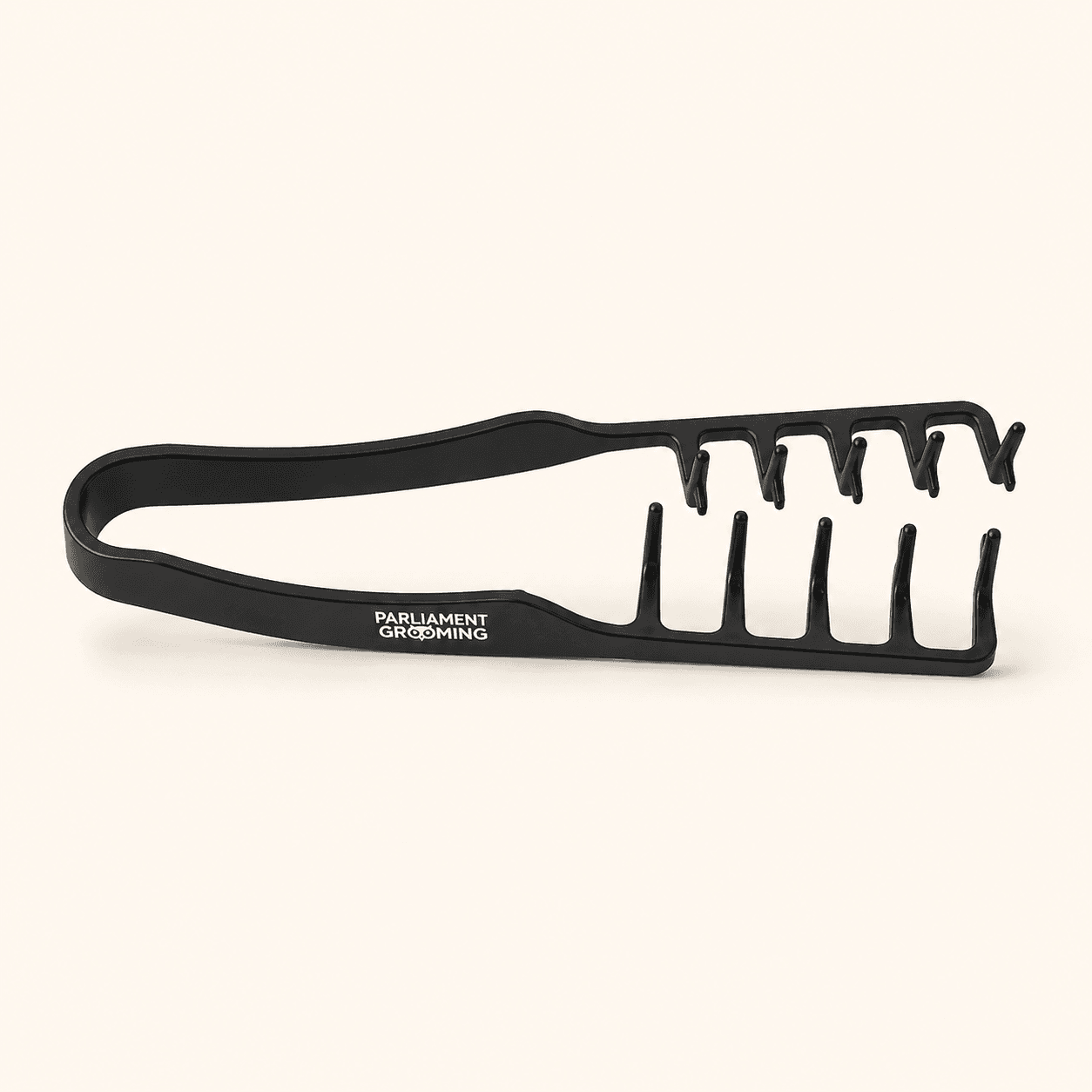 The Textured Comb, matte black with open two-row teeth, on bone stock